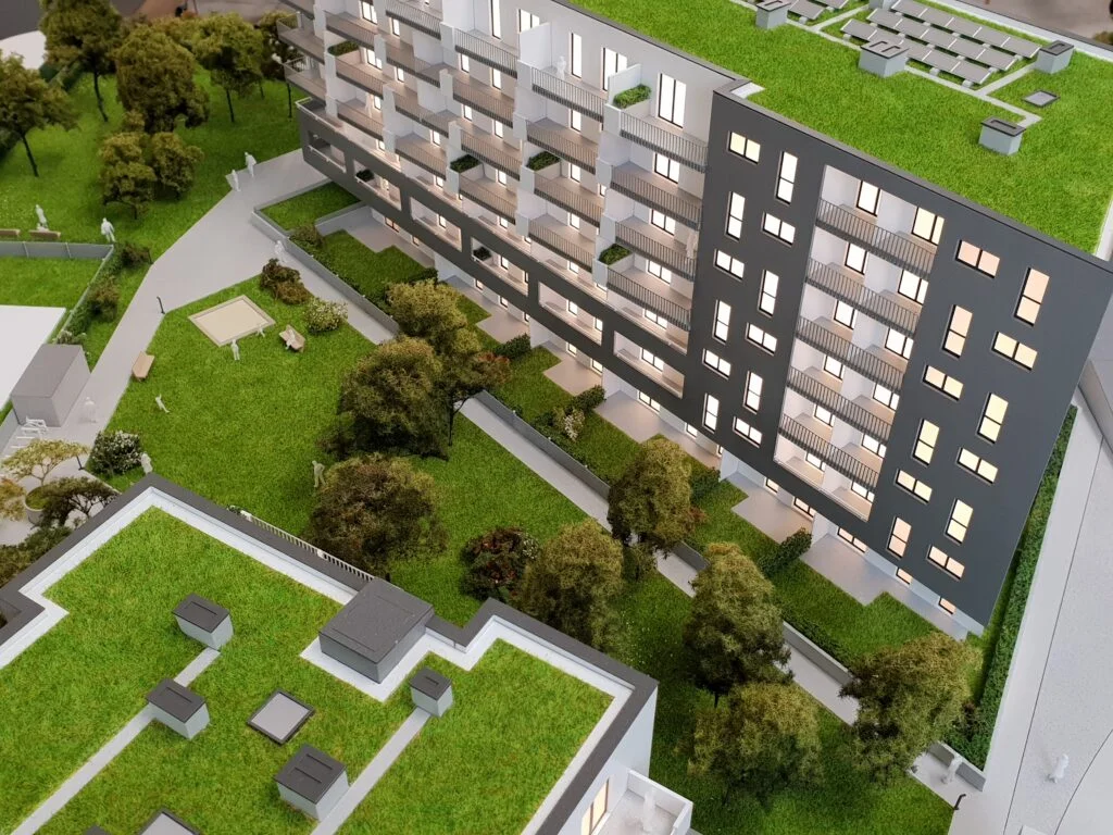 Vollfarbiges Architekturmodell 1:100 – Wohnhaus mit Terrassen, Begrünung und detaillierter Fassadengestaltung.