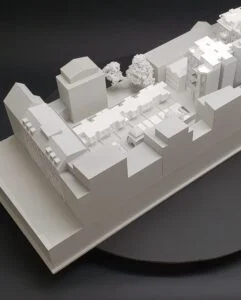 Architekturmodell mit homogener Darstellung – Innenhofbebauung mit vereinfachten Volumen und Bäumen.