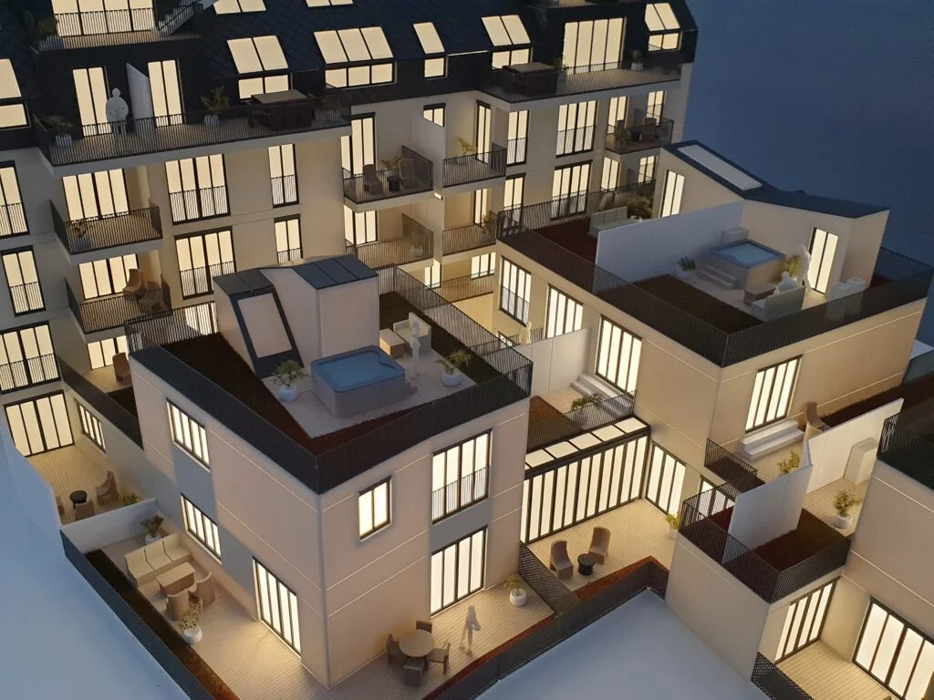 Architekturmodell 1:100 – Wohnhaus mit beleuchteten Innenräumen, Dachterrassen und detailreicher Fassadengestaltung.