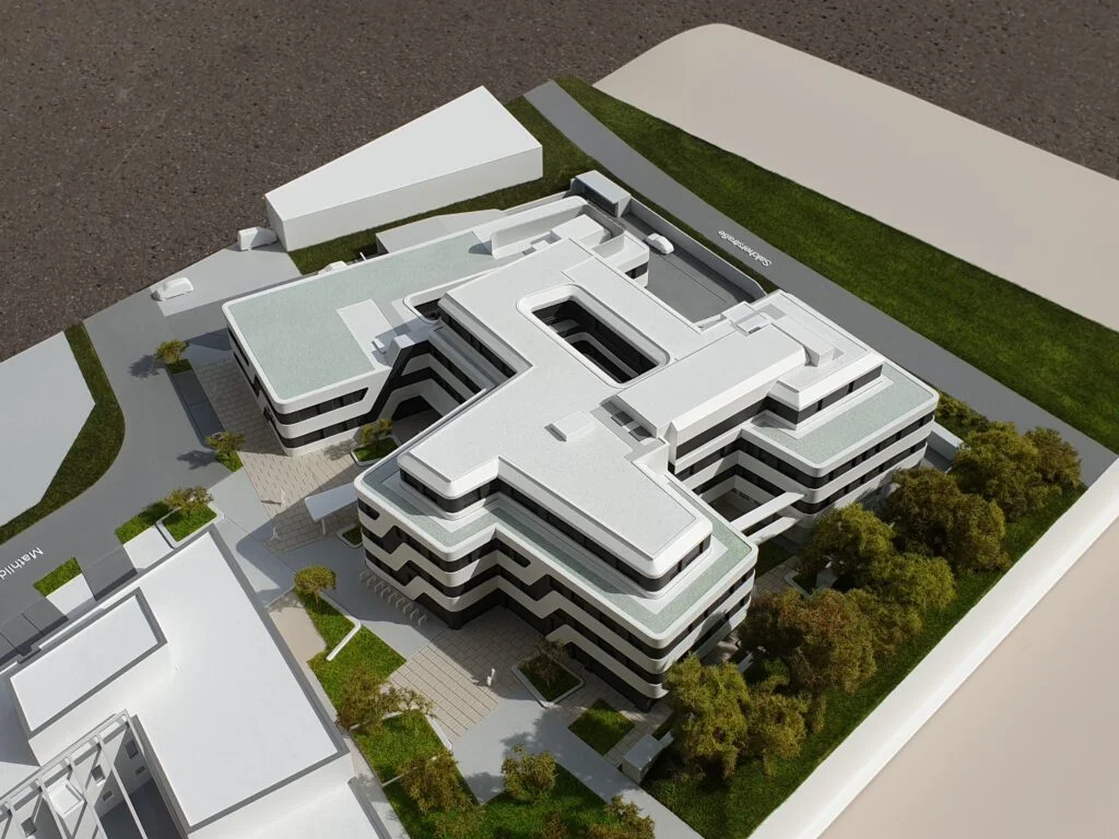 Landschaftsmodell Bürogebäude – moderner Gebäudekomplex mit Grünflächen und detaillierter Umgebungsdarstellung.