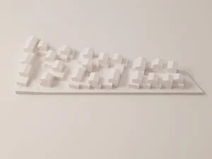 Städtebauliche Massenstudie im Weißmodell mit klaren Baukörpern und kompakter Quartierstruktur.