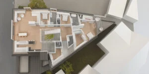 Dachgeschoss-Grundriss eines Architekturmodells mit sichtbarer Raumaufteilung, Möblierung und Terrassen.