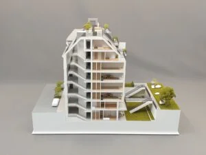 Architekturmodell im Schnitt mit offenen Etagen, Treppenhaus, Innenräumen und Grünflächen – detaillierter Gebäudeschnitt im Maßstab.