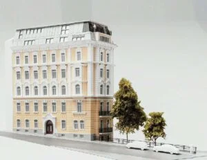 Detailliertes Architekturmodell eines historischen Wohngebäudes mit modernem Dachausbau und Fassadensanierung.