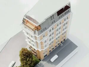 Detalliertes Architekturmodell eines Wohngebäudes mit Dachausbau und Fassadengestaltung im Maßstab M1:100.