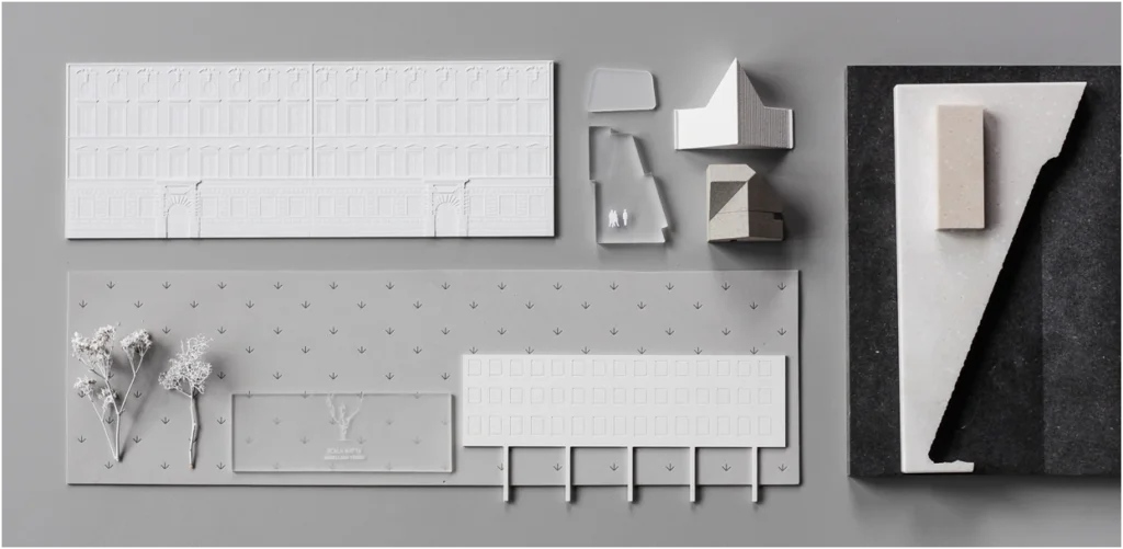 Weißes Architekturmodell als Immobilien-Weißmodell mit reduzierter Fassadendarstellung und monochromem Detaillierungsgrad