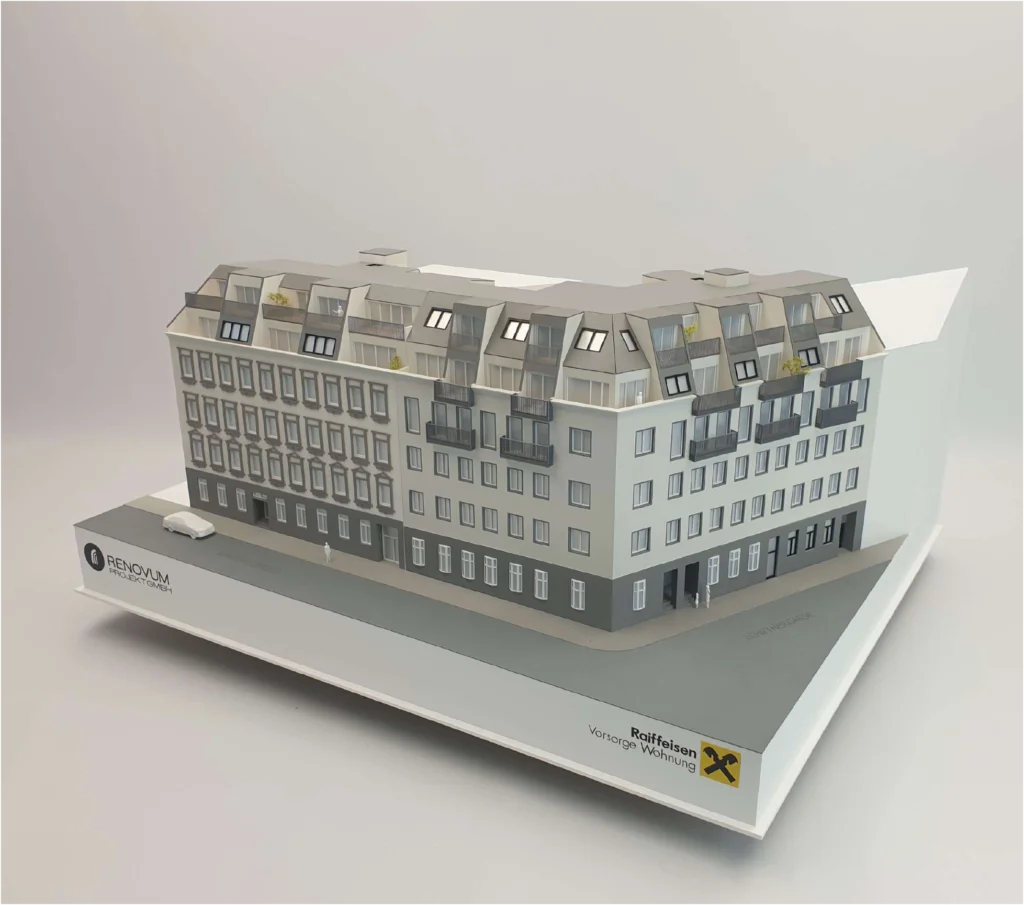 Wohnbau-Modell im Maßstab 1:100 – mittlere Detaillierung Architekturmodell eines Neubauprojekts im Maßstab 1:100 mit mittlerem Detaillierungsgrad"