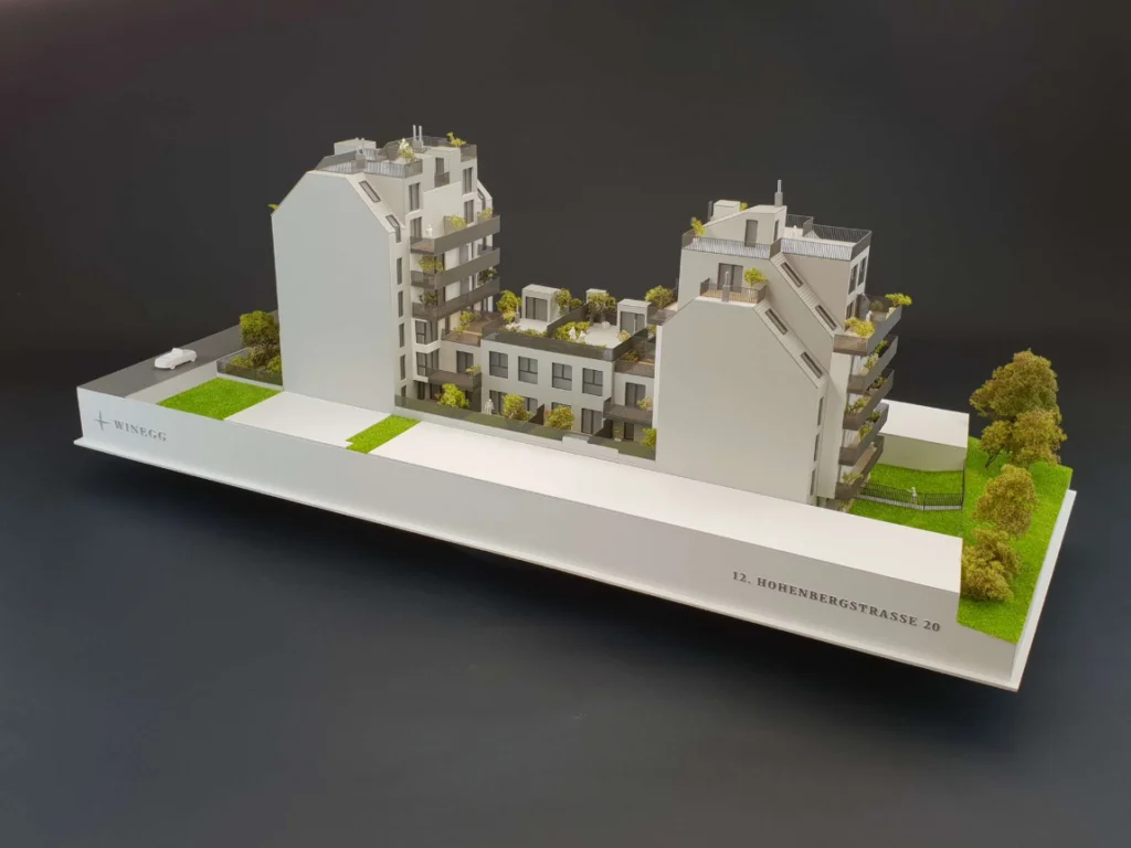 Immobilienmodell mit reduzierter Darstellung der Umgebungsgebäude, transparente Baukörper zur Analyse von Volumen, Höhenentwicklung und städtebaulicher Einbindung